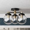 Hawthorne | Chandeliers by Illuminate Vintage. Item composed of brass and glass