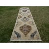 Vintage Organic Wool Tribal Style Faded Turkish Runner Rug | Rugs by Vintage Pillows Store. Item made of cotton