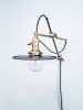 Raw Steel and Brass Industrial Scissor Wall Lamp | Sconces by Retro Steam Works. Item composed of metal in industrial style