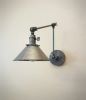 Swinging Adjustable Wall Light - Industrial Brass Sconce | Sconces by Retro Steam Works. Item composed of brass in industrial style