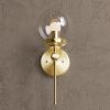 Pierson | Sconces by Illuminate Vintage. Item composed of brass & glass