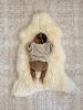 Bright Ivory Nursery Sheepskin | Small Rug in Rugs by East Perry. Item composed of fabric