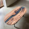 Oval epoxy river dining table | Tables by Ironscustomwood. Item made of walnut