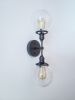 2-Arm Matte Black Modern Wall Sconce Clear Shade Industrial | Sconces by Retro Steam Works. Item composed of metal in industrial style