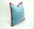 blue velvet pillow with red pom poms // blue and red pillow | Pillows by Velvet Fringe