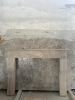 Handmade Travertine Fireplace Mantel: Custom Carved Marble Surround | Fireplaces by AEGEAN MARBLE ARTISAN ATELIER