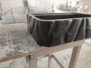 Hand-Carved Black Marble Bathroom Sink: Sculptured Toros Design | Water Fixtures by AYMARBLEDESIGN LLC