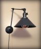 Plug in Swinging Adjustable Wall Light - Industrial Sconce | Sconces by Retro Steam Works. Item made of metal works with industrial style