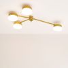 Celeste Incadescence | Chandeliers by DESIGN FOR MACHA. Item composed of brass and glass