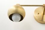 Mid Century Vanity - Model No. 5469 | Sconces by Peared Creation. Item composed of brass