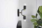 Calvert | Sconces by Illuminate Vintage. Item composed of brass