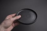Black matte stoneware saucer/small plate/little dish | Tableware by Laima Ceramics. Item composed of stoneware compatible with minimalism and contemporary style