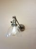 Swinging Adjustable Wall Light - Industrial Antique Brass | Sconces by Retro Steam Works. Item composed of metal and glass