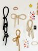 Clay Object 91 - Large Bow Hanging | Wall Sculpture in Wall Hangings by OBJECT-MATTER / O-M ceramics