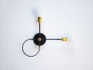 Minimalist Black and Gold Wall Sconce - 2 Bulb Light Fixture | Sconces by Retro Steam Works. Item composed of brass compatible with minimalism and mid century modern style