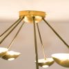 Helios Septem II | Chandeliers by DESIGN FOR MACHA. Item made of brass