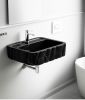 Hand-Carved Black Marble Bathroom Sink: Sculptured Toros Design | Water Fixtures by AYMARBLEDESIGN LLC
