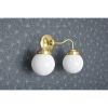 Norwood | Sconces by Illuminate Vintage. Item made of brass & glass