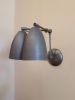 Kitchen Shelves Adjustable Wall Light - Industrial Sconce | Sconces by Retro Steam Works. Item composed of metal in mid century modern or industrial style