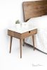 Nightstand in solid Walnut / oak board and top in Marble | Storage by Manuel Barrera Habitables. Item composed of walnut and marble