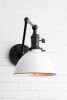 Articulating Light - Model No. 8551 | Sconces by Peared Creation. Item composed of brass