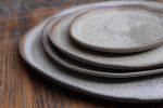 STC organic natural shape stoneware plate in grey cream | Dinnerware by Laima Ceramics. Item composed of stoneware compatible with minimalism style