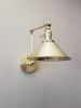 Swing Arm Adjustable Wall Light - Brushed Brass Gold | Sconces by Retro Steam Works. Item made of metal compatible with industrial style