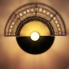 Warind Wall Lamp | Sconces by Home Blitz. Item composed of brass