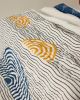 Spiral Sunset Quilt (Reverse) | Linens & Bedding by CQC LA. Item made of cotton