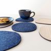 Blue felt and bleached wood oval coasters. Set of 6 | Tableware by DecoMundo Home. Item composed of oak wood & fabric compatible with minimalism and coastal style
