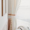 Leather Curtain Tieback [V'ed End] | Strap in Storage by Keyaiira | leather + fiber | Artist Studio in Santa Rosa. Item made of leather