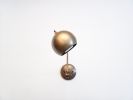 LED Adjustable Wall Globe Sconce - Industrial Ball Light | Sconces by Retro Steam Works. Item composed of brass in industrial style