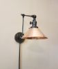 Plug in Swing Arm Adjustable Wall Light - Industrial Sconce | Sconces by Retro Steam Works. Item made of brass works with industrial style