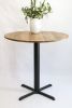 Modern Round Hackberry Pub Table with Black Steel Legs | Side Table in Tables by Hazel Oak Farms. Item composed of wood and metal