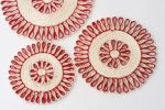 Handwoven Seagrass Placemat | Trivet | Red | Tableware by NEEPA HUT. Item composed of fabric