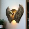 Adler Wing Wall Lamp | Sconces by Home Blitz. Item made of brass