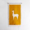 LLAMA Handwoven Tapestry, Ochre | Wall Hangings by ANDEAN. Item composed of wool & bronze compatible with contemporary and traditional style