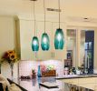 ELETTRA · Peacock Blue | Pendants by LUMi Collection. Item composed of glass
