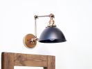 Swing Arm Adjustable Wall Light - Industrial Sconce | Sconces by Retro Steam Works. Item made of brass works with mid century modern & industrial style