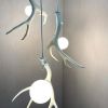 Deer Antler Chandelier | Chandeliers by Farmhaus + Co.. Item composed of glass