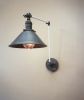 Swinging Adjustable Wall Light - Industrial Sconce | Sconces by Retro Steam Works. Item composed of metal compatible with mid century modern and industrial style