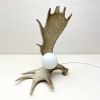 Moose Antler Lamp - Natural | Table Lamp in Lamps by Farmhaus + Co.. Item made of ceramic