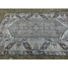 Vintage Handwoven Low Pile Faded Pale Medium Turkish Ushak | Area Rug in Rugs by Vintage Pillows Store. Item composed of wool and fiber