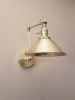 Swing Arm Adjustable Wall Light - Brushed Brass Gold | Sconces by Retro Steam Works. Item made of metal compatible with industrial style