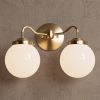 Norwood | Sconces by Illuminate Vintage. Item made of brass & glass