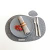 Gray felt irregular oval placemats and coasters. Set for 2 | Tableware by DecoMundo Home. Item composed of fabric & aluminum compatible with minimalism and country & farmhouse style