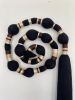 Black Boho Wall Hanging with Tassel, Handmade Modern Fiber Art Wall Decor, Statement Textile Wall Art | Macrame Wall Hanging in Wall Hangings by RavaTapestryArt