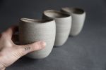 STC cup "Shell" -organic natural shape stoneware in grey | Drinkware by Laima Ceramics. Item composed of stoneware in minimalism style