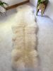 Double Sheepskin in Golden White (One-of-a-Kind) | Area Rug in Rugs by East Perry. Item made of fiber