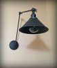 Swinging Adjustable Wall Light - Industrial Wall Sconce | Sconces by Retro Steam Works. Item composed of metal compatible with industrial style